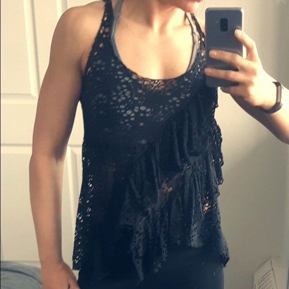 Sleeveless asymmetric crochet style top